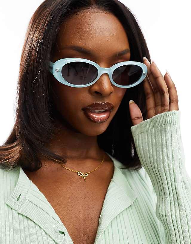 Mint Green Cardigan and Bow Pendant Necklace with Light Blue Oval Sunglasses — Oval Sunglasses Outfits