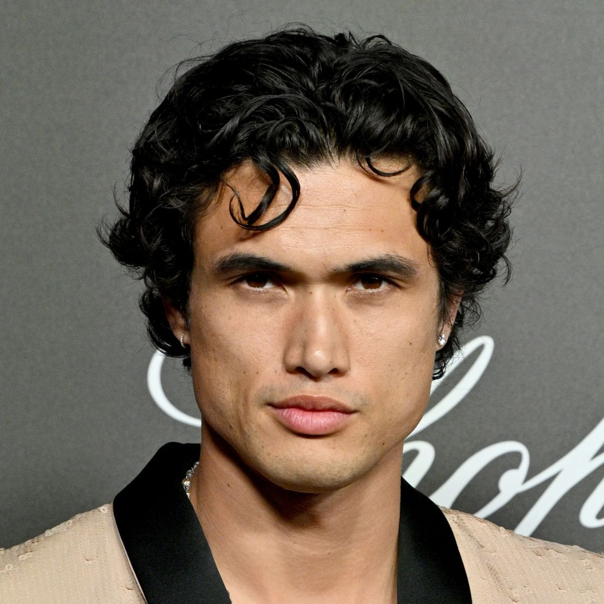 Collarbone Visual Idea — Curly Hairstyles for Men