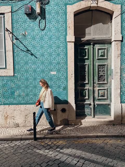 Cream Jacket Over Orange Top with Light Blue Jeans — Lisbon Outfits