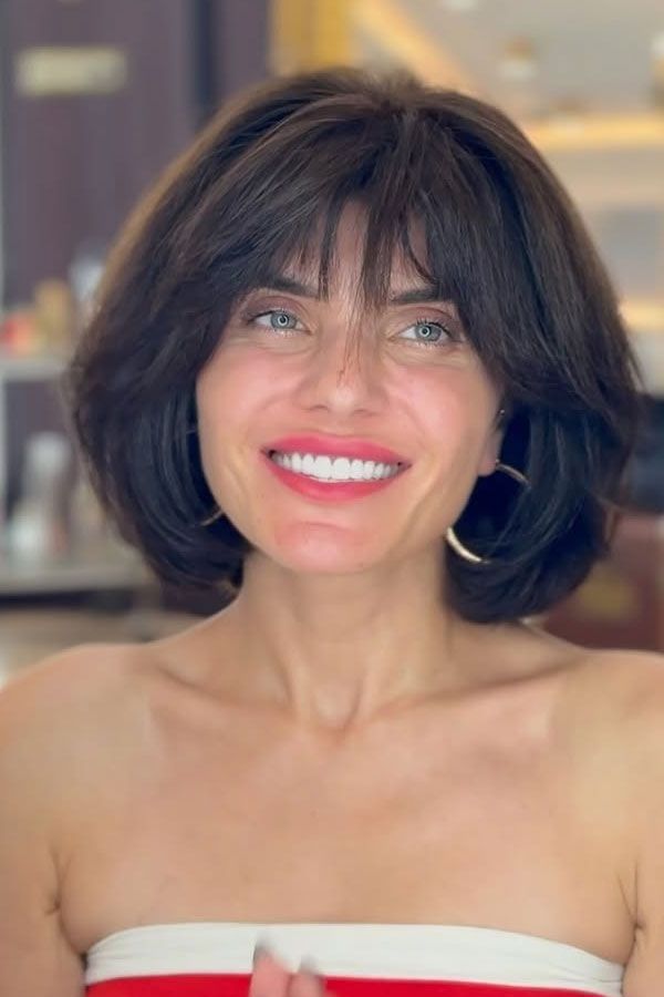 Voluminous Dark Bob With Curtain Bangs — Bob with Bangs