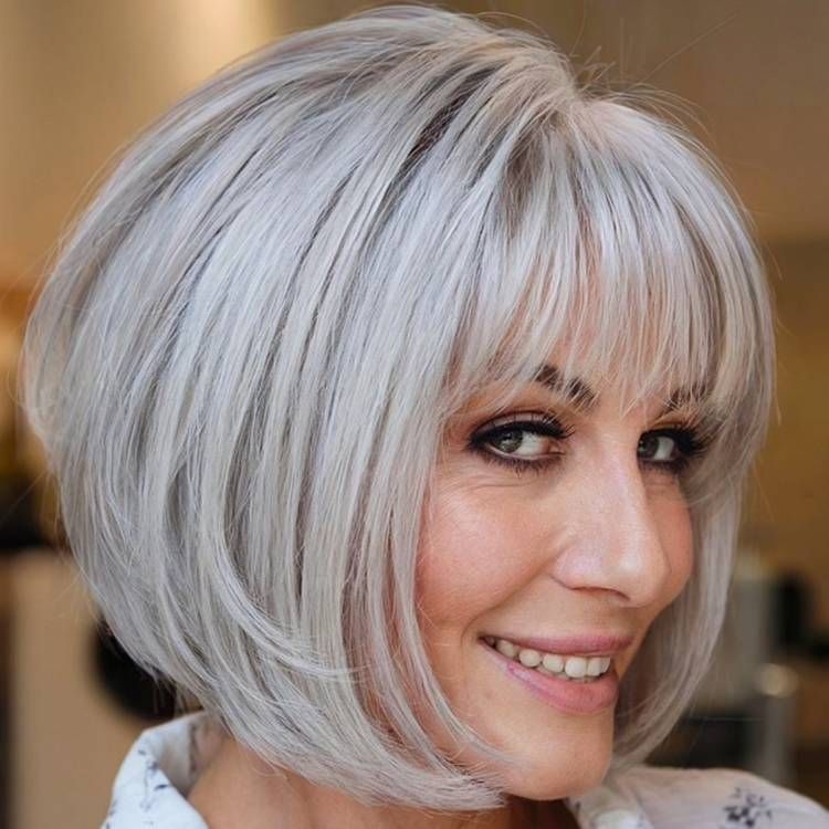 Voluminous Silver Layered Bob With Full Fringe Voluminous Silver Layered Bob With Full Fringe — Bob for Women Over 50