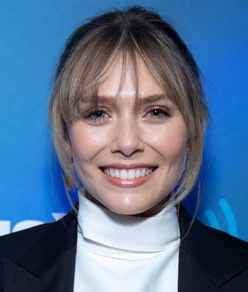 Air-Dried Wavy Bob With Curtain Bangs — Hairstyles for Oval Faces