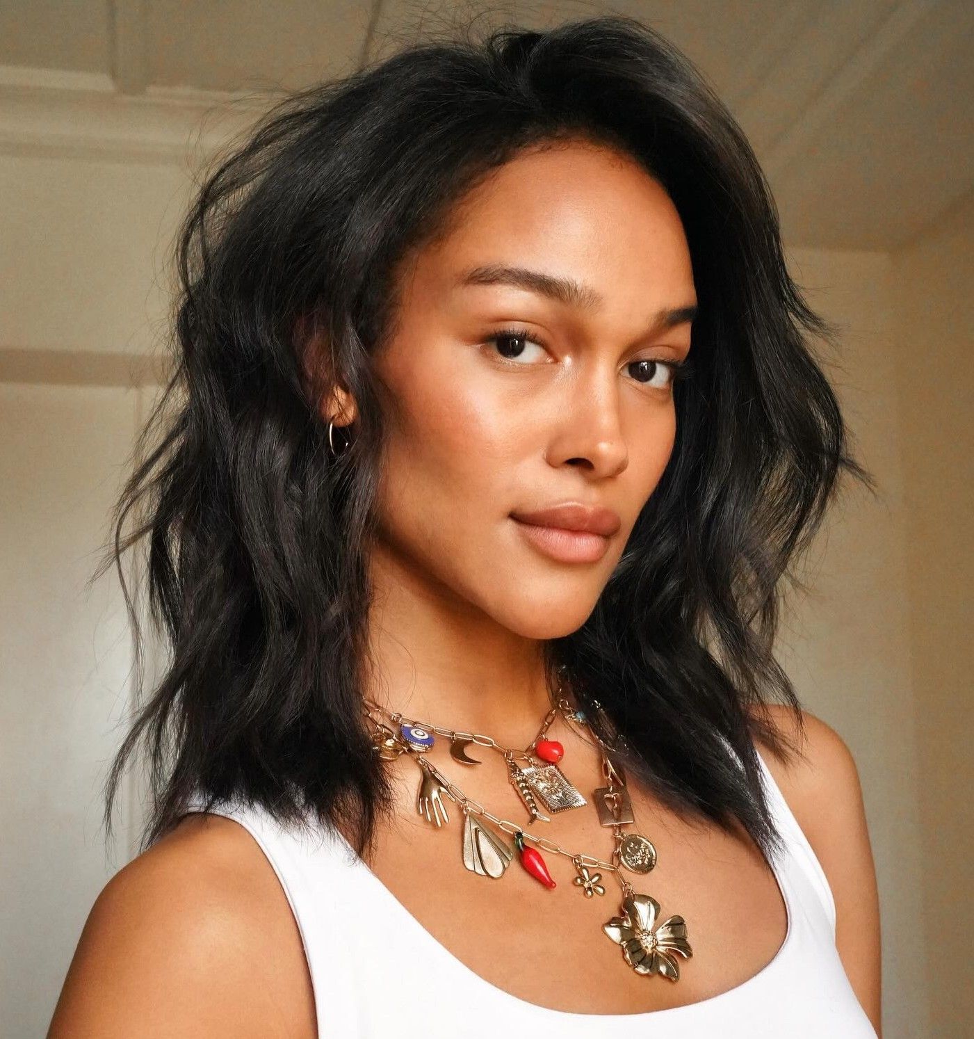 Dark Brown Shoulder-Length Layers With Wispy Bangs — Hairstyles for Big Forehead