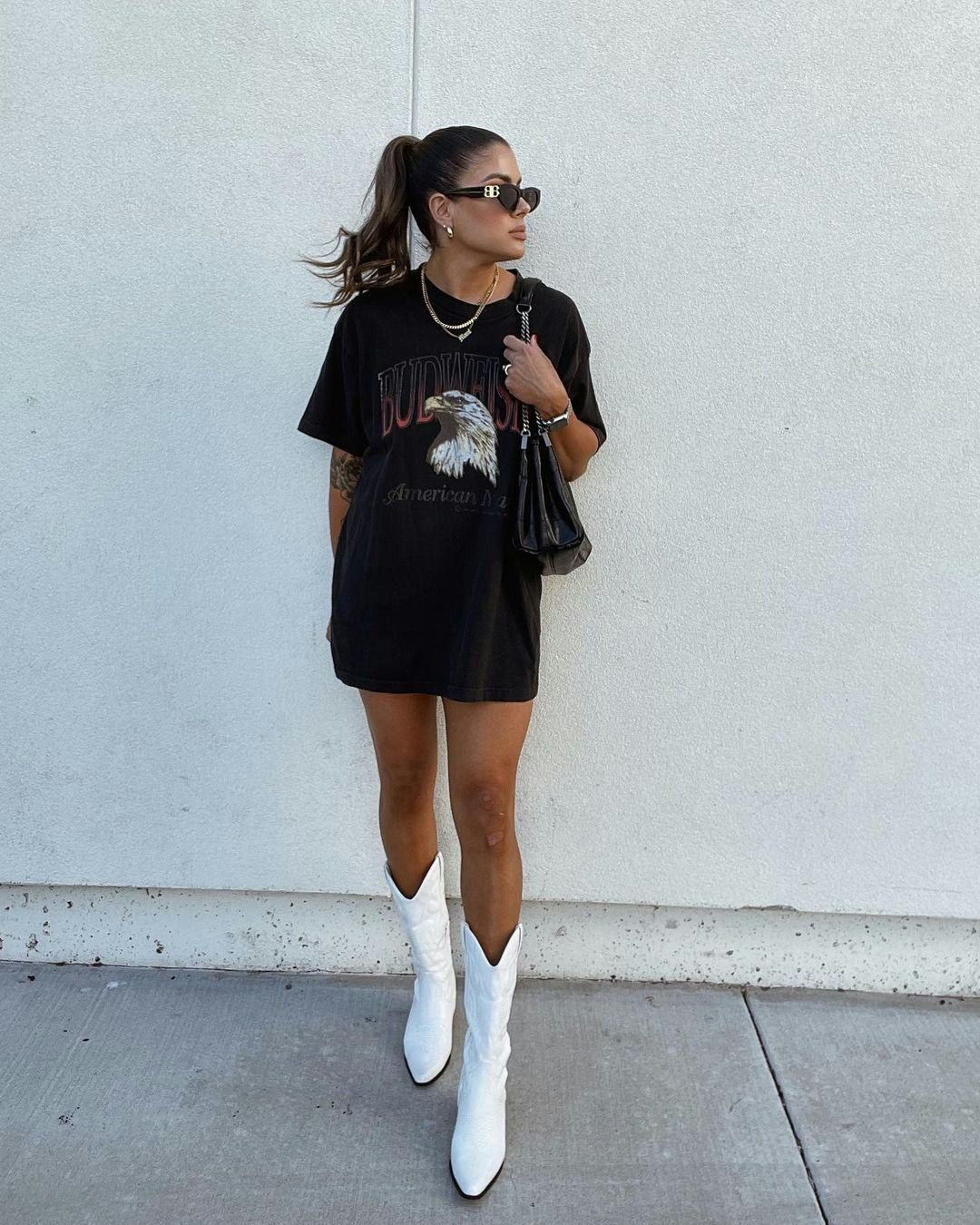 Effortless Cool: White Cowboy Boots with Graphic T-Shirt Dress — Cowboy Boots with Skirt Outfits