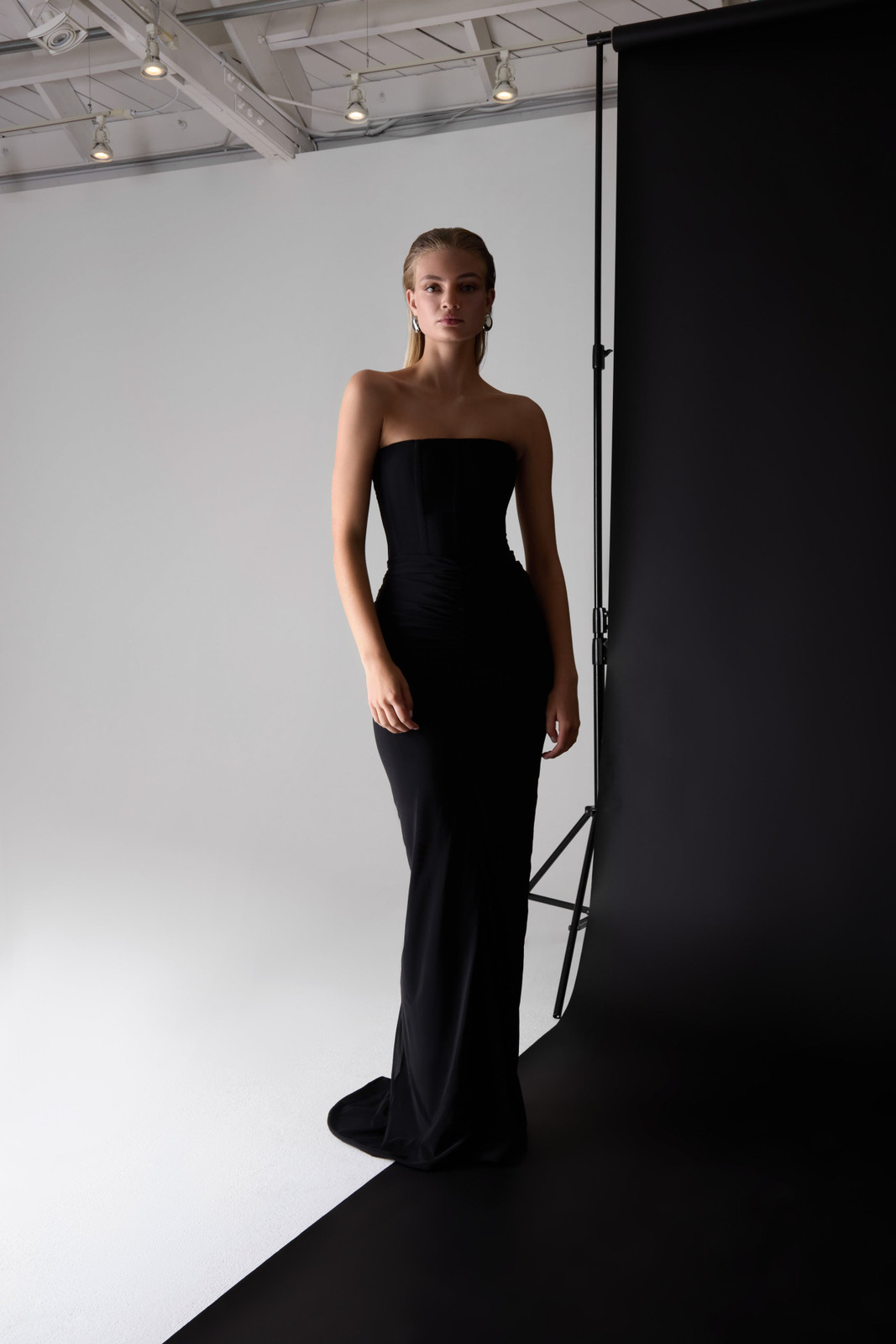 Black Strapless Corset Maxi Gown with Sculpted Bodice and Train Black Strapless Corset Maxi Gown with Sculpted Bodice and Train — Corset Dresses