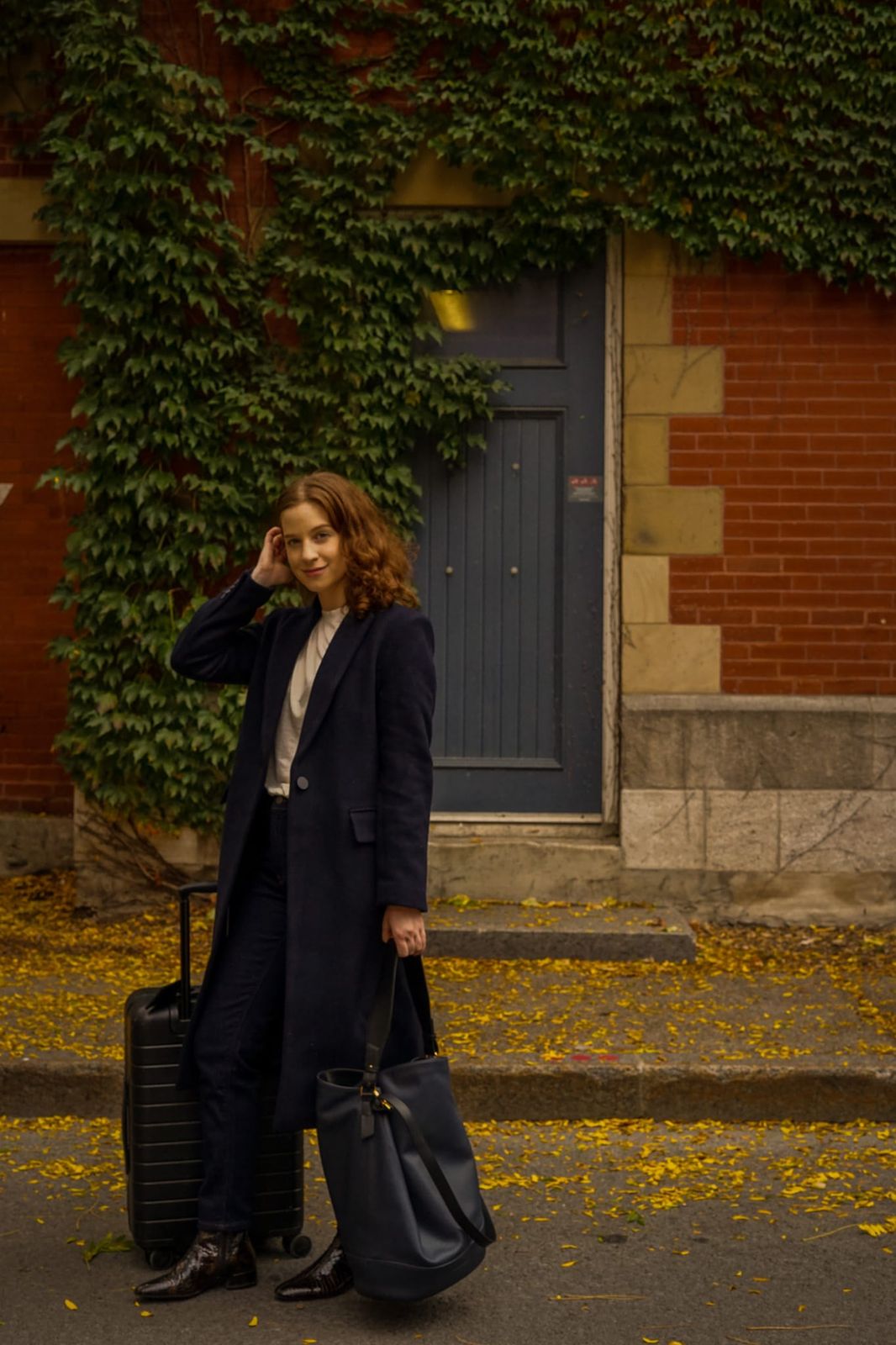 Long Navy Coat and Trousers for a Polished Business Trip Arrival Long Navy Coat and Trousers for a Polished Business Trip Arrival — Business Trip Outfits