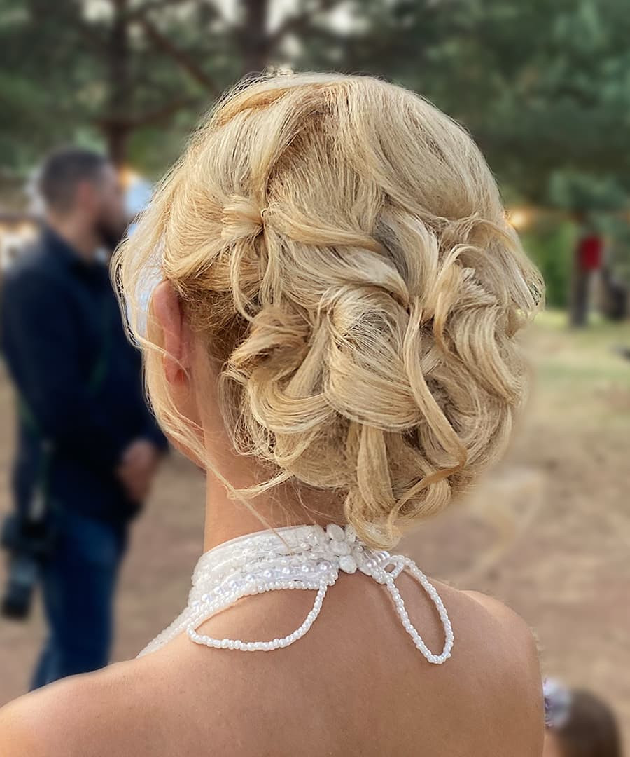 Mid-Back Visual Idea — Messy Low Bun