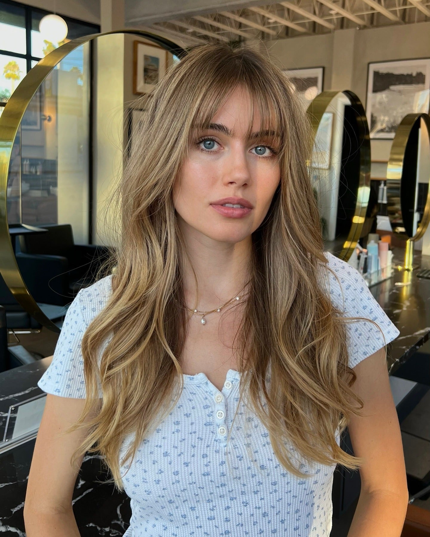 Patterned Button-Up Top and Full Blonde Wispy Bangs