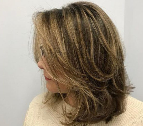 Medium Brown Shag with Blonde Highlights — It Features Blonde Highlights Throughout Medium Brown Shag with Blonde Highlights — It Features Blonde Highlights Throughout — Brown Hair Over 50