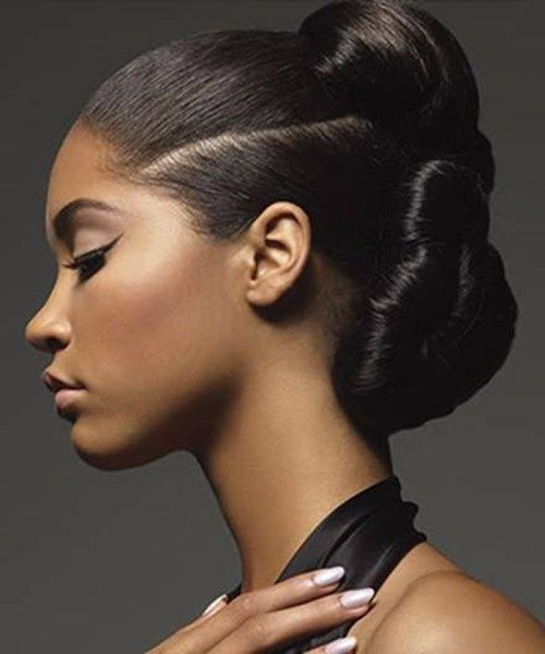 Sculpted Black Updo With Dramatic Volume Sculpted Black Updo With Dramatic Volume — Wedding Hairstyles for Black Women