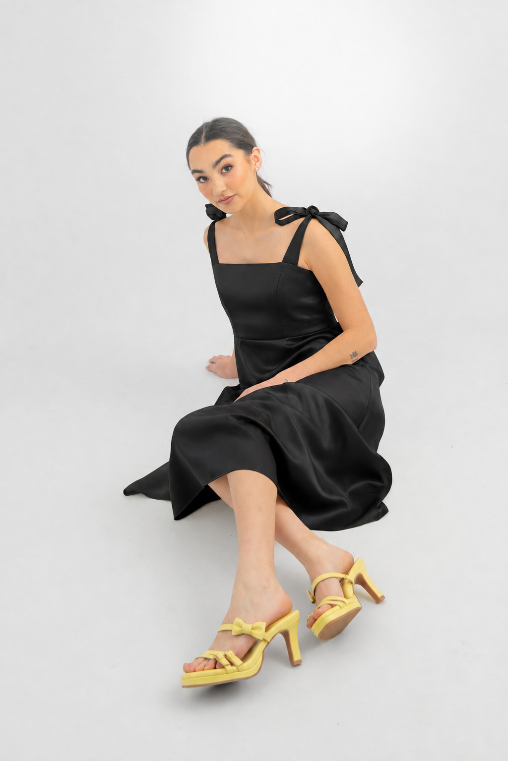 Bold Statement: Yellow Bow-Detail Heels with a Black Midi Dress Bold Statement: Yellow Bow-Detail Heels with a Black Midi Dress — Heels Outfits