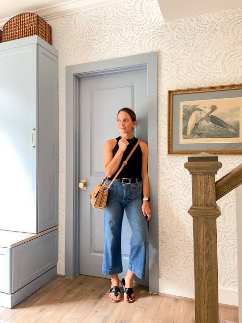 Minimalist Monochrome: Black Sleeveless Top with Blue Wide Leg Cropped Jeans — Wide Leg Jeans Outfits