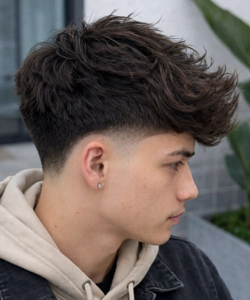 Voluminous Swept Back Wavy Top Fade Voluminous Swept Back Wavy Top Fade — Low Taper Fade