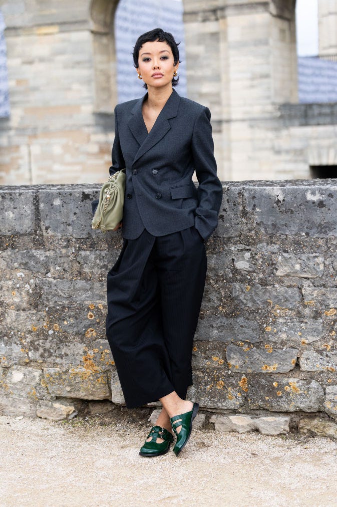 Dark Green Mules Complementing a Charcoal Grey Suit — Workwear Aesthetic Outfits