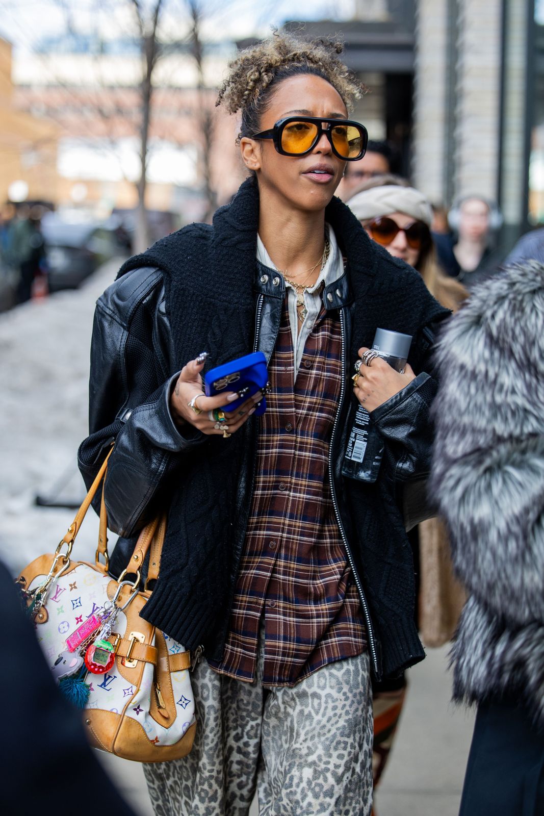 Street Style: Orange Oval Sunglasses, Plaid Shirt, and Leopard Trousers — Oval Sunglasses Outfits