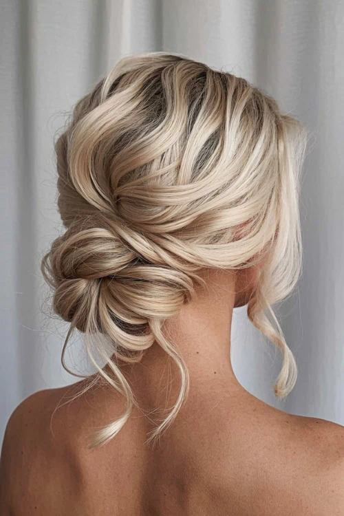 Voluminous Messy Updo with Loose Tendrils — Updos for Medium Hair