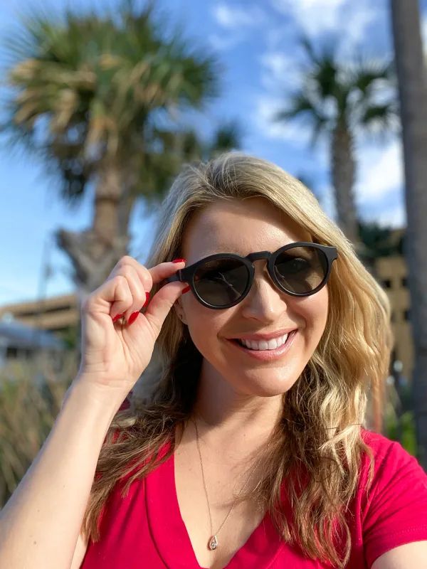 Black Round Sunglasses with Red V-Neck Top — Sunglasses for Heart Shaped Face
