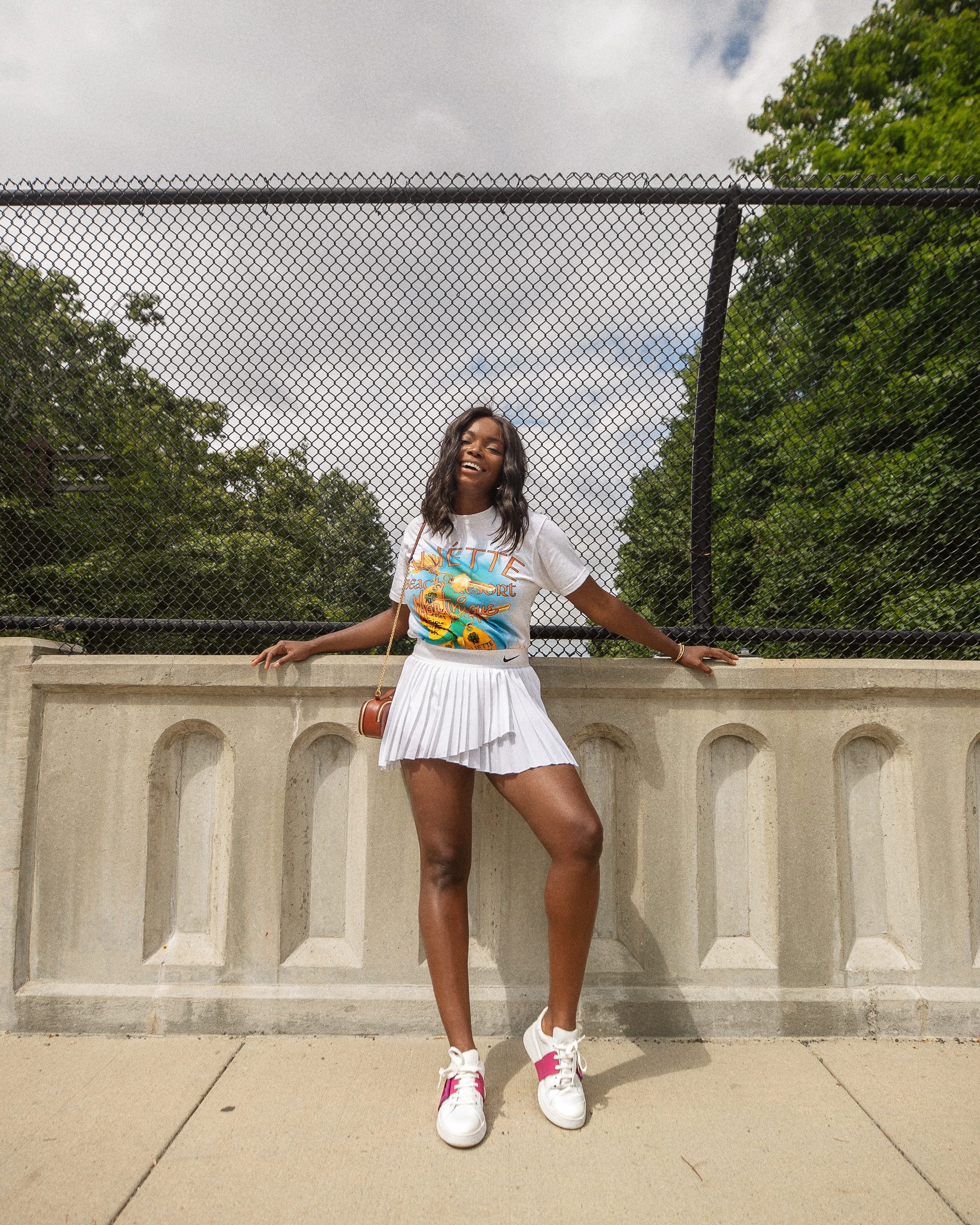 White Pleated Tennis Skirt with Colorful Landscape Graphic T-shirt White Pleated Tennis Skirt with Colorful Landscape Graphic T-shirt — Tennis Skirt Outfits