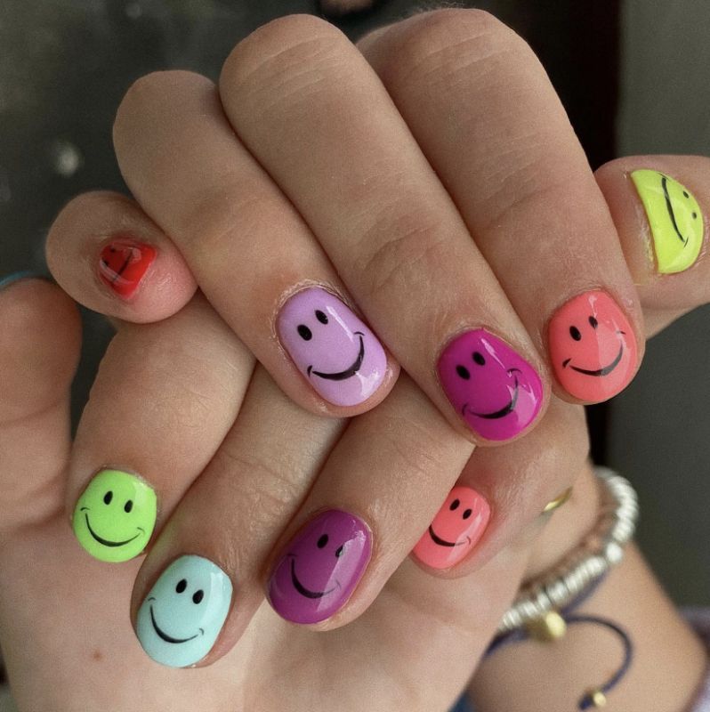 Pastel Smileys on Short Ovals — Smiley Face Nails
