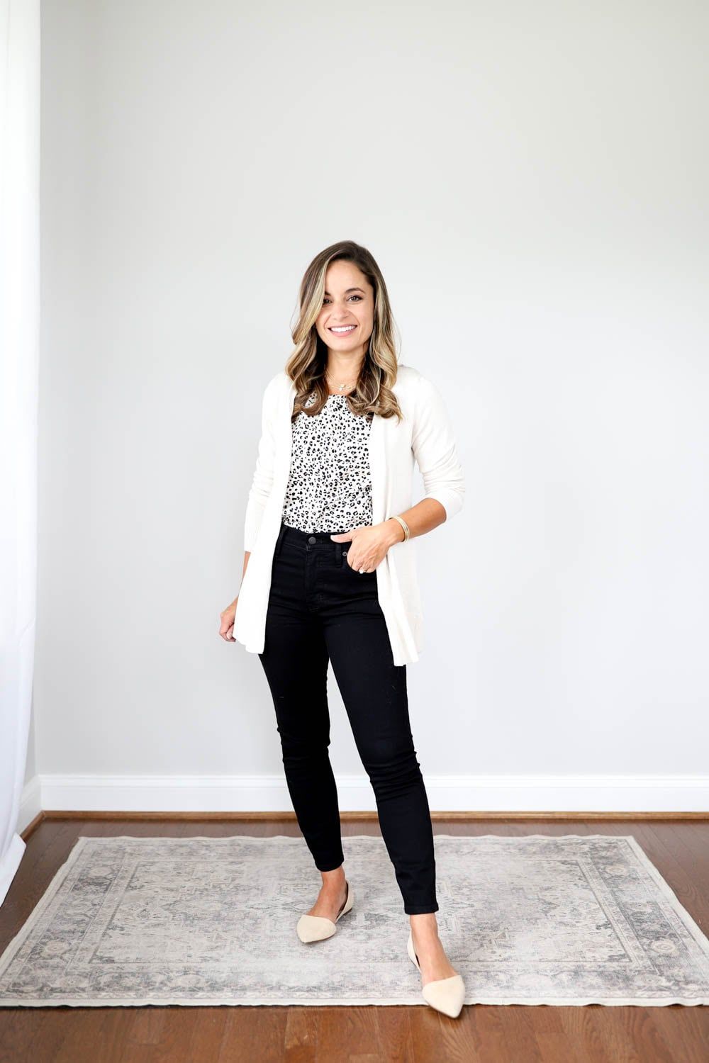 Pattern Play: Fitted Black Jeans with Leopard Top and Cream Cardigan Pattern Play: Fitted Black Jeans with Leopard Top and Cream Cardigan — Black Jeans Outfits