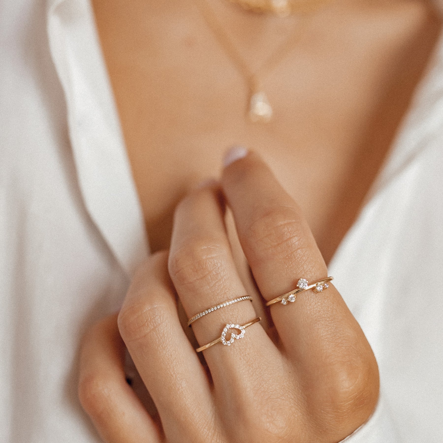 Heart-Shaped Gold Ring in a Delicate Stack Heart-Shaped Gold Ring in a Delicate Stack — Stacked Rings