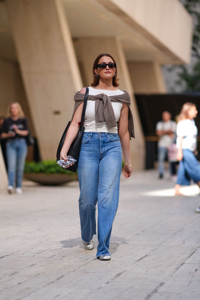 Sweater Draped Over Shoulders with Straight Leg Jeans — Straight Leg Jeans Outfits
