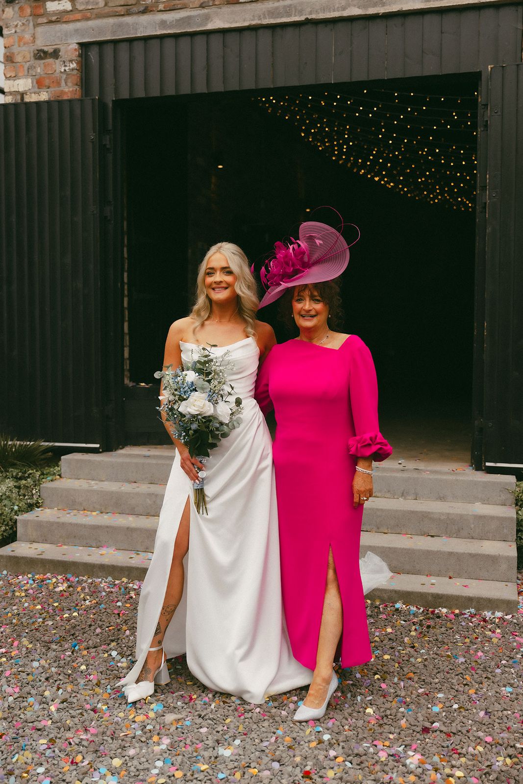 Vibrant Pink Puff Sleeve Dress with Large Fascinator — Grandmother of the Bride Outfits