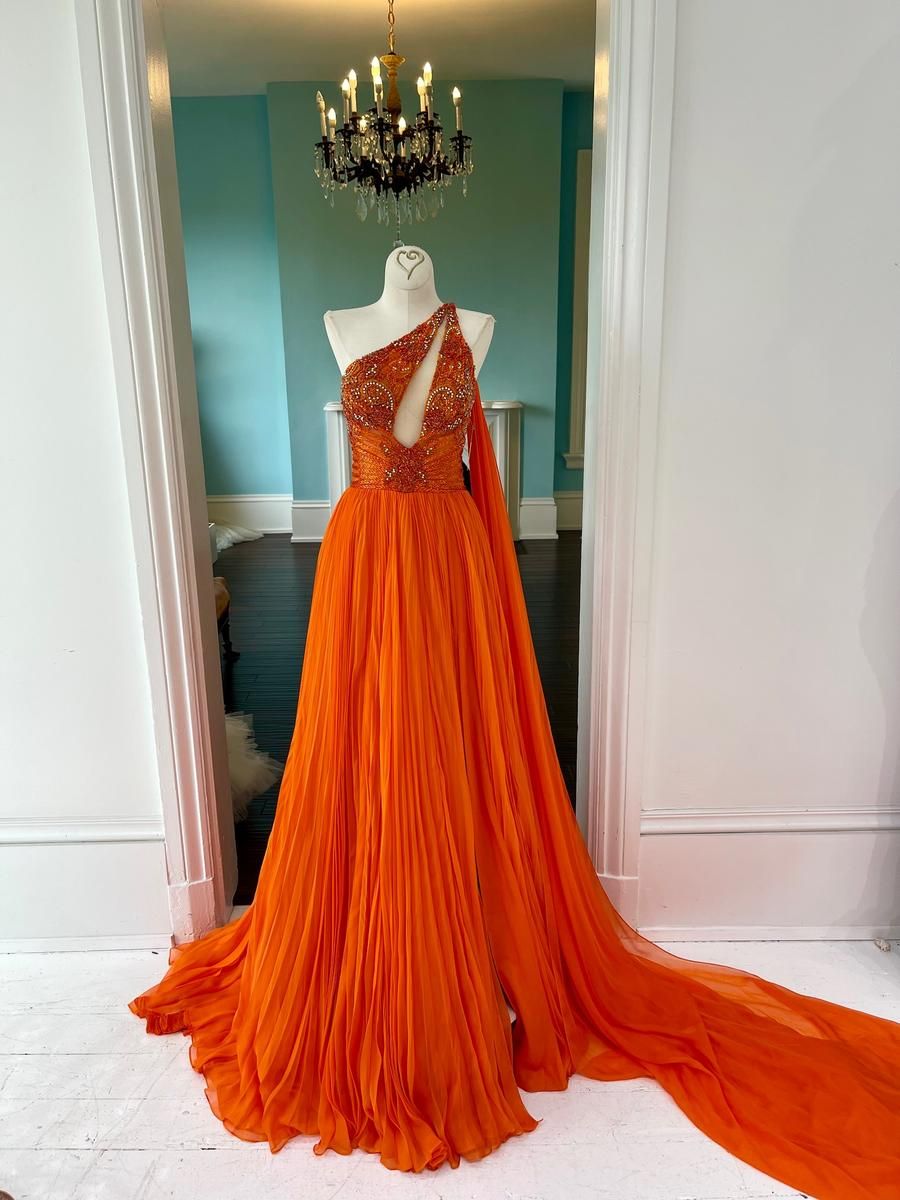 Orange Chiffon Gown with One-Shoulder Cape-Like Sleeve and Pleated Skirt Orange Chiffon Gown with One-Shoulder Cape-Like Sleeve and Pleated Skirt — Pageant Dresses