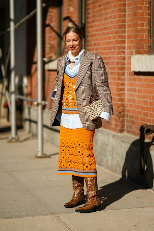 Textural Play: Brown Cowboy Boots with Patterned Skirt and Sweater Vest — Cowboy Boots with Skirt Outfits