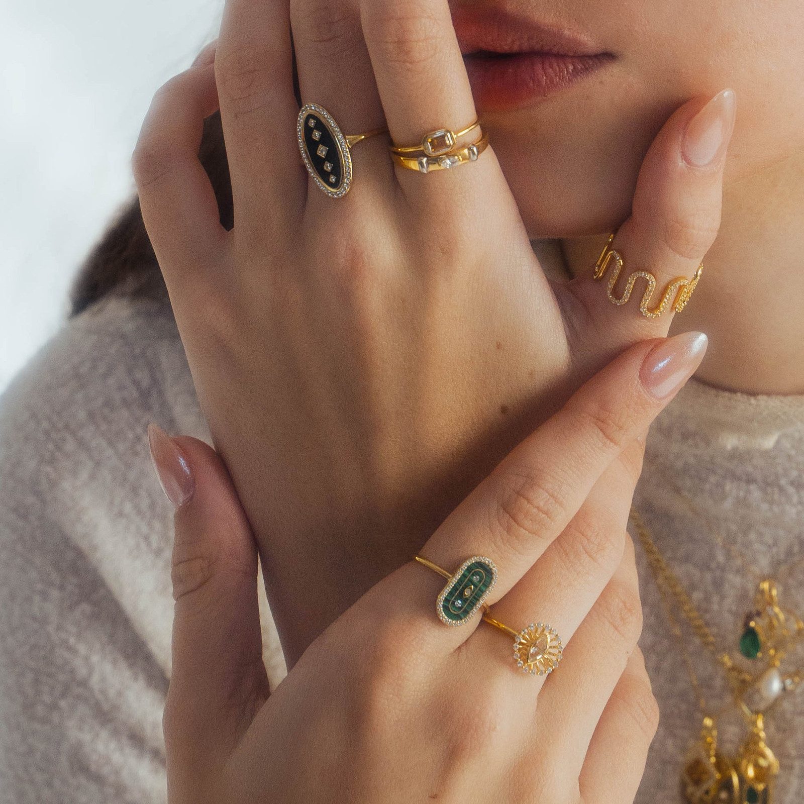 Black and Green Inlay Ring with Knit Sweater — Cocktail Rings