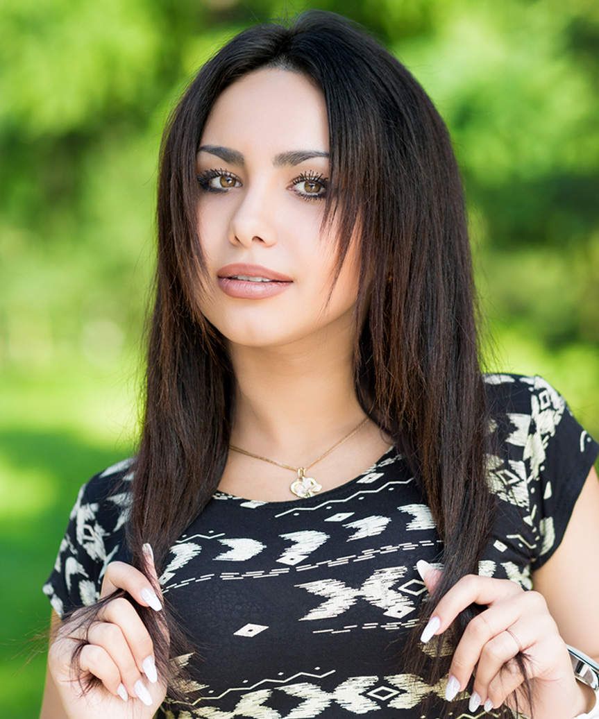 Dark Brown with Soft Waves and Face-Framing — Hairstyles for Long Faces