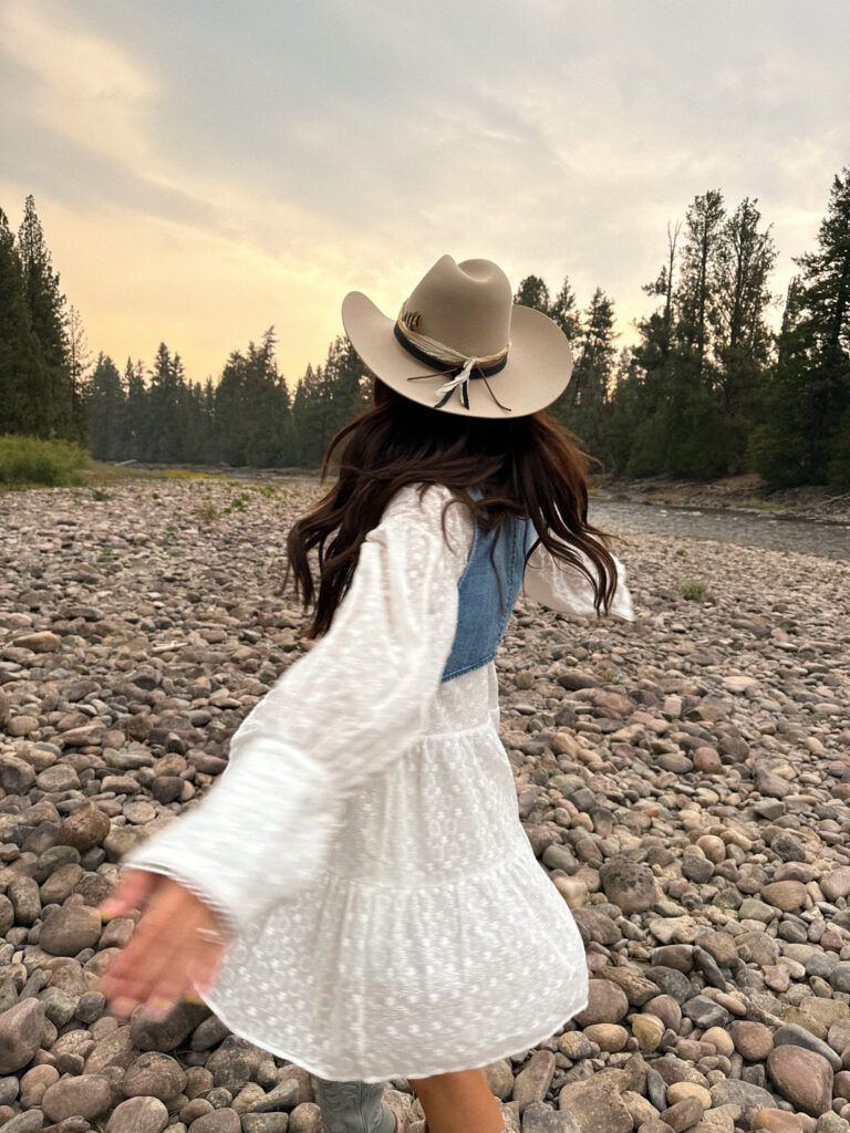 Tiered Eyelet Dress with Denim Vest and Feathered Hat Tiered Eyelet Dress with Denim Vest and Feathered Hat — Yellowstone Outfits