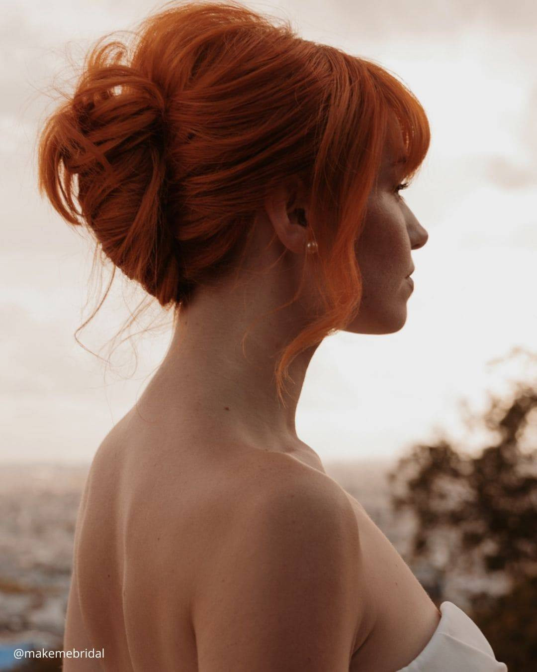 Medium Visual Idea Medium Visual Idea — Low Bun with Curtain Bangs