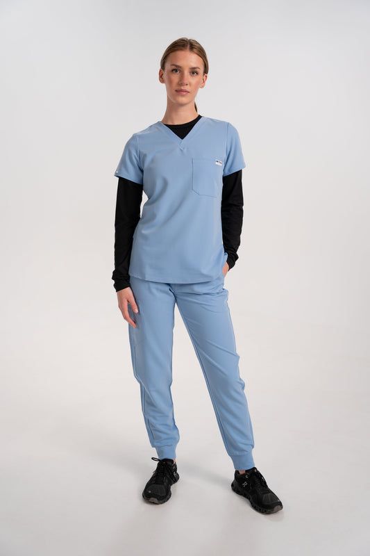Light Blue Scrubs Layered Over Black Long-Sleeve Light Blue Scrubs Layered Over Black Long-Sleeve — Scrubs Outfits