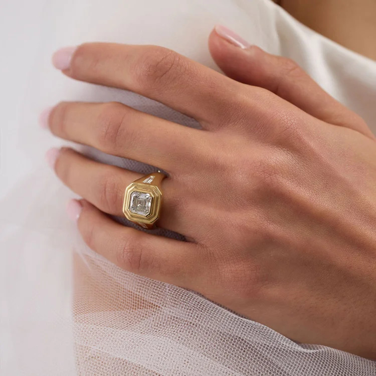 Emerald-Cut Gemstone Chunky Ring on White Fabric — Chunky Rings