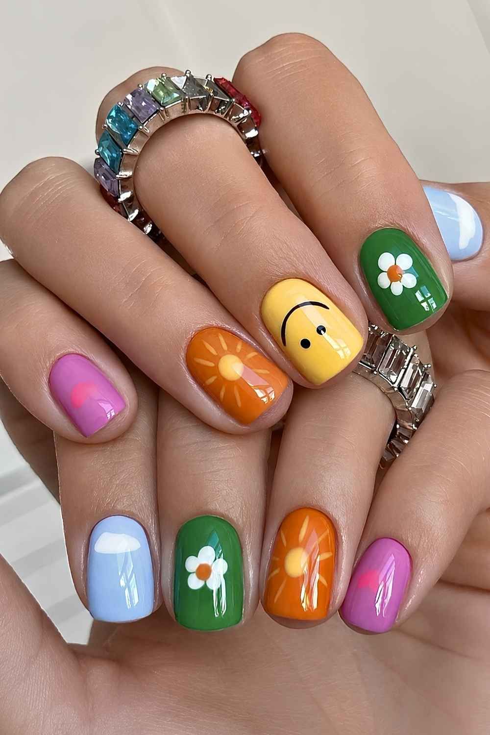 Short Square Bright Color Graphics — Smiley Face Nails