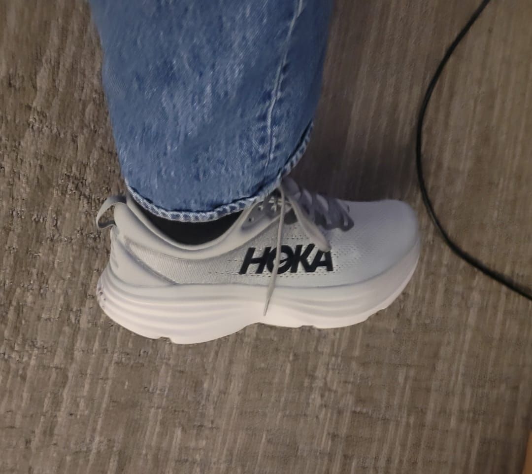 Black Hoka Sneakers with Chunky Sole and Olive Trousers Black Hoka Sneakers with Chunky Sole and Olive Trousers — Hoka Outfits