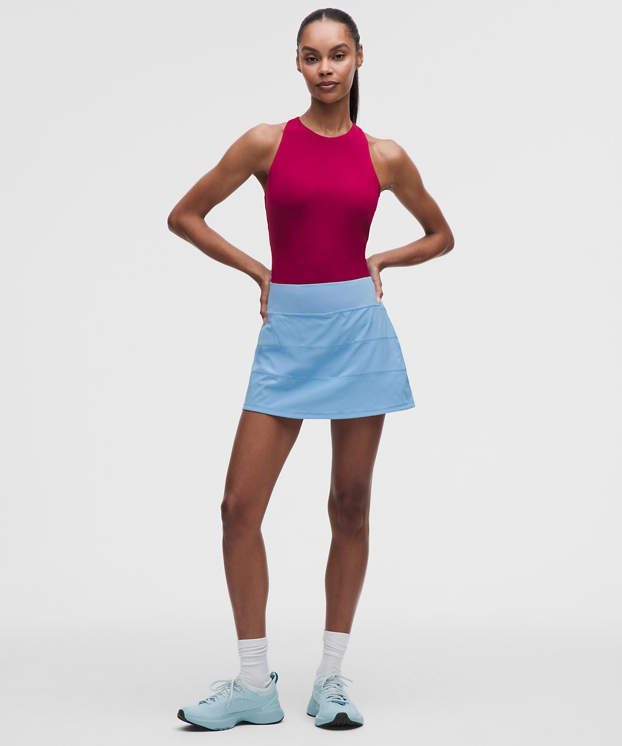 Color Block Athleisure: Pink Top and Light Blue Skirt — Tennis Skirts