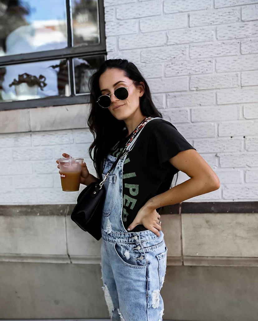 Casual Distressed Denim Overalls with Black T-Shirt and Strappy Heels Casual Distressed Denim Overalls with Black T-Shirt and Strappy Heels