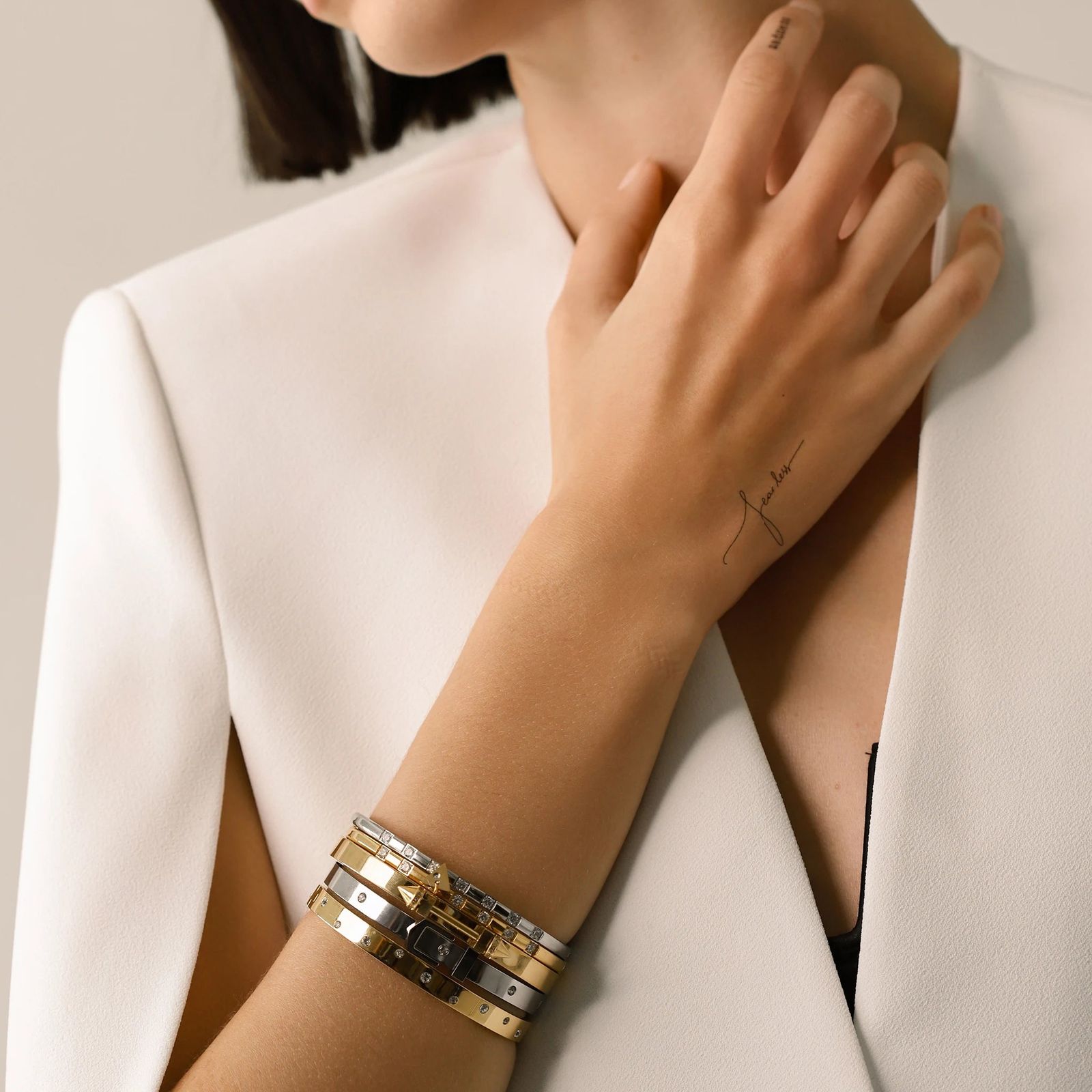 Sleek Mixed Metal Bangles with a White Blazer — Bangle Stacks