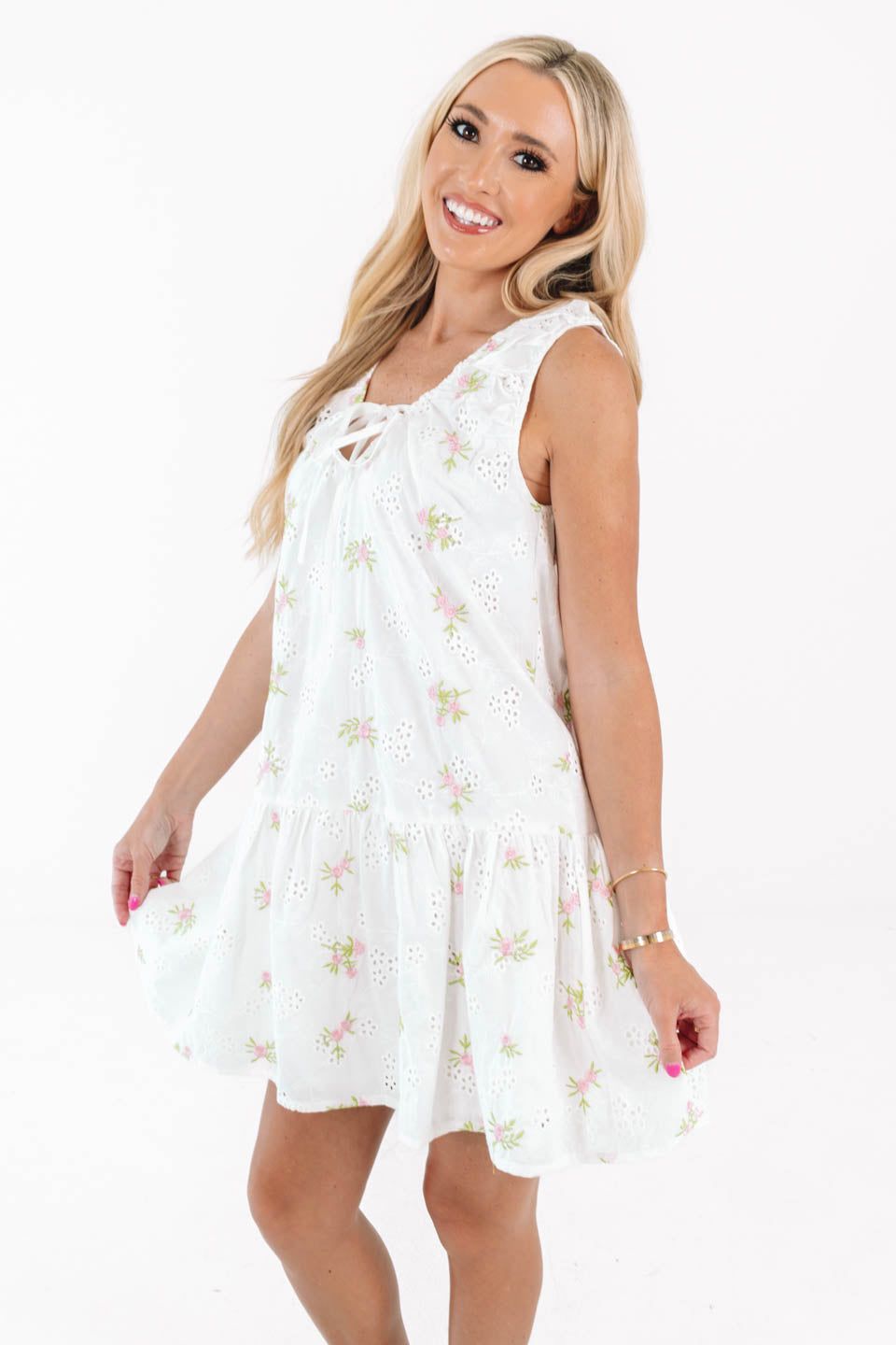 White Tiered Eyelet Mini Dress with Floral Embroidery White Tiered Eyelet Mini Dress with Floral Embroidery — Bridal Shower Dresses