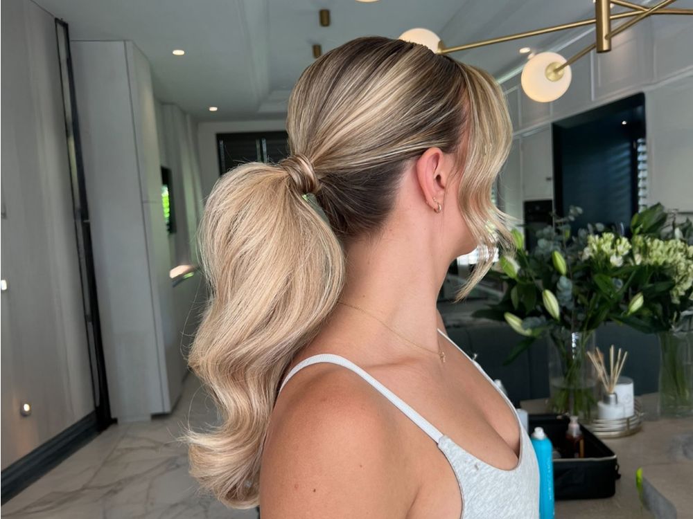 Ash Blonde High Ponytail With Polished Waves Ash Blonde High Ponytail With Polished Waves — Curly High Ponytail