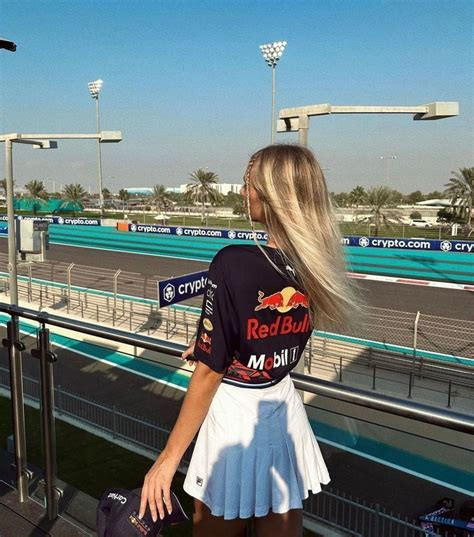 Sporty Red Bull Racing Top with Pleated Skirt for Trackside Fun Sporty Red Bull Racing Top with Pleated Skirt for Trackside Fun — F1 Race Outfits