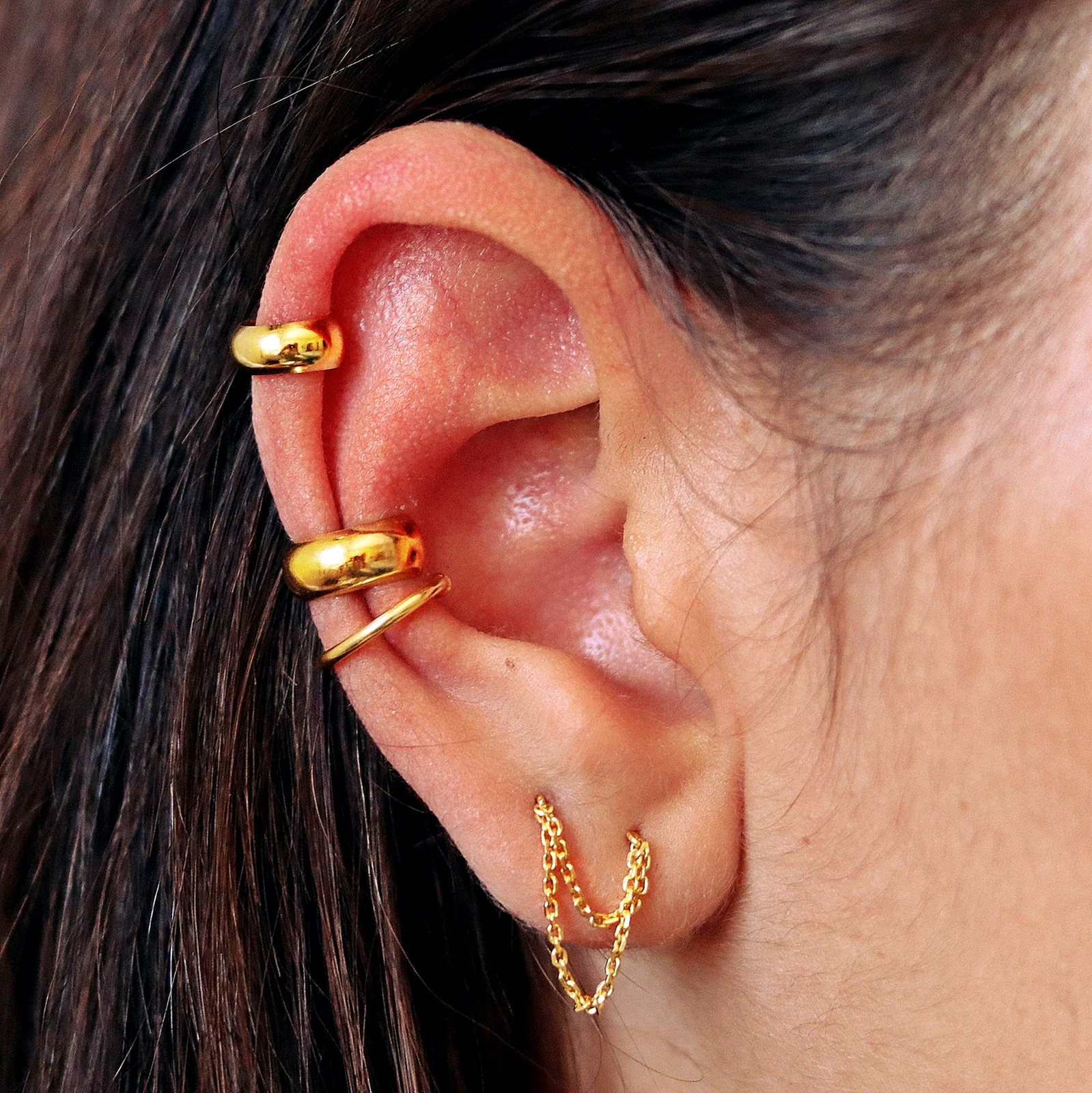 Not Visible Stacked Gold Ear Cuffs for a Bold Statement Not Visible Stacked Gold Ear Cuffs for a Bold Statement