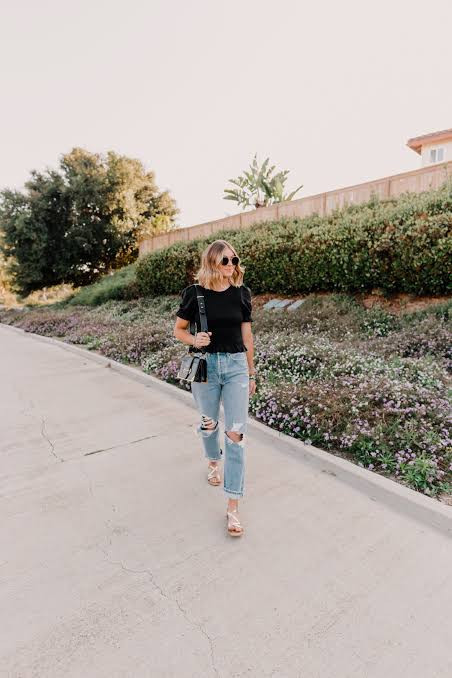 Black Top with Ripped Light-Wash Jeans and White Sandals — San Diego Outfits