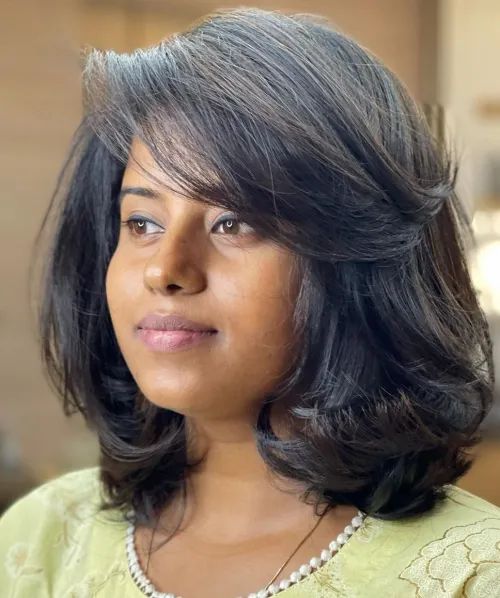 Voluminous Chin-Length Layered Bob — Haircuts for Chubby Faces