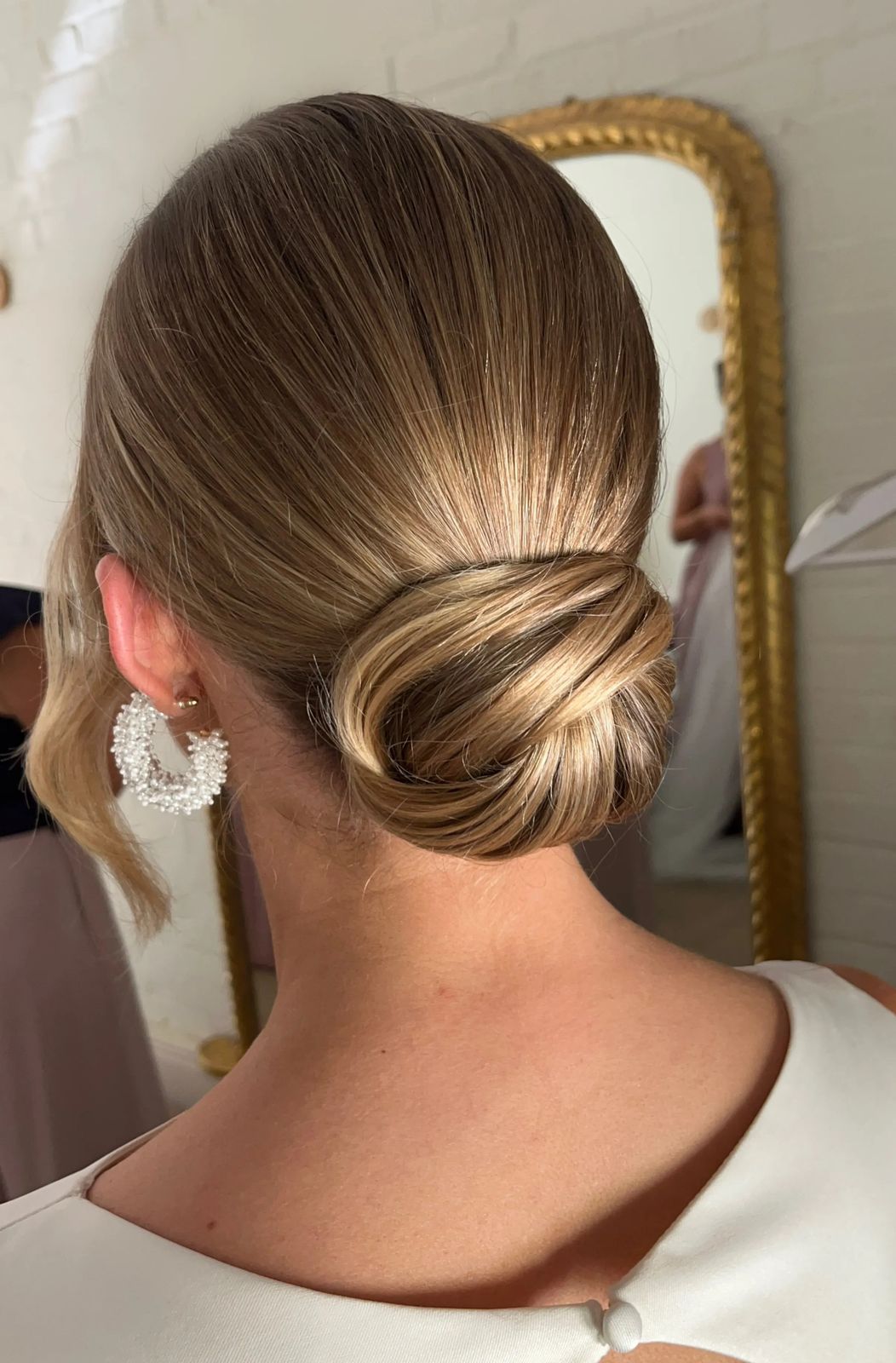 Sleek Low Bun With Side Part Sleek Low Bun With Side Part — Hairstyles for Servers