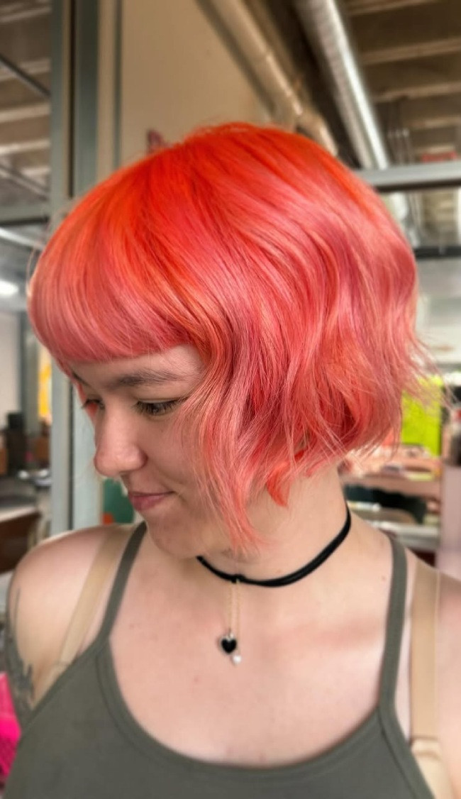 Vibrant Coral Bob with Soft Waves — Coral Hair