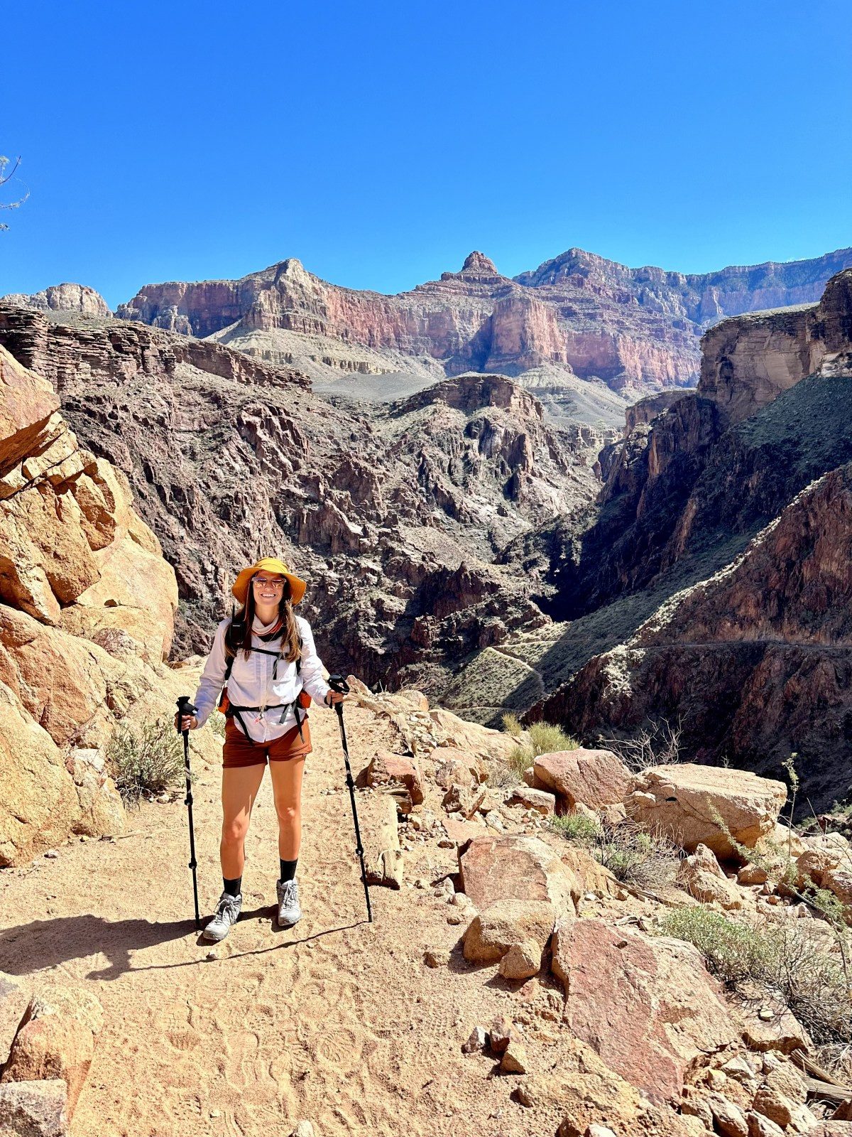 Hiker's Essential: Orange Shorts and Sun Hat — Grand Canyon Outfits