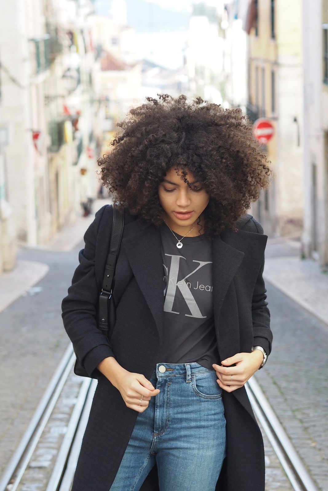 Grey T-Shirt Under Black Wool Coat with Blue Denim Jeans — Lisbon Outfits